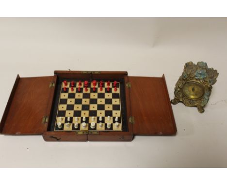 A VINTAGE MAHOGANY TRAVELLING CHESS SET TOGETHER WITH A VINTAGE GILT  CLOCK 