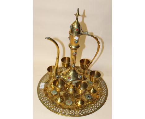 A MIDDLE EASTERN STYLE JEWELED TEAPOT AND SIX GOBLETS WITH TRAY (8)