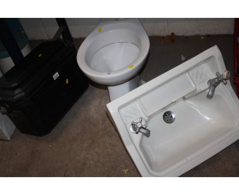 A CERAMIC TOILET AND SINK TOGETHER WITH  A BAKELITE TOILET CISTERN