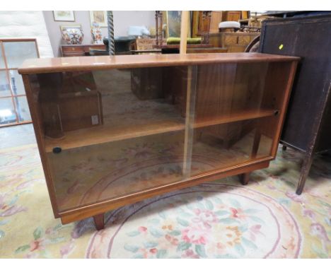 A VINTAGE TEAK GLAZED BOOKCASE - W 84 CM