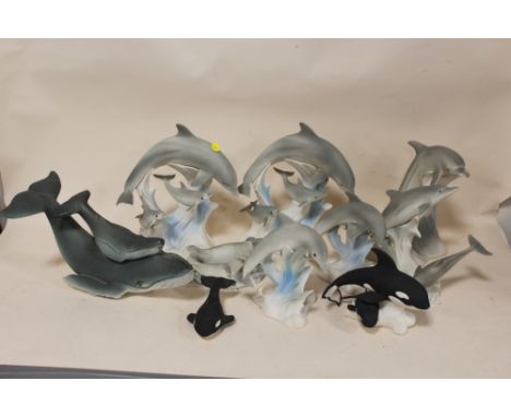 A TRAY OF HIGHBANK PORCELAIN DOLPHIN AND WHALE FIGURES ETC.