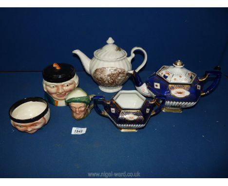 A Brittania pottery sucrier and teapot, Royal Doulton 'Auld Mac' Toby jug D5824, biscuit barrel, etc.