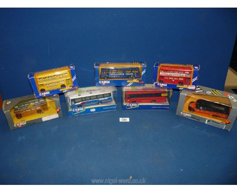 A box of Corgi model buses in good condition, boxed.