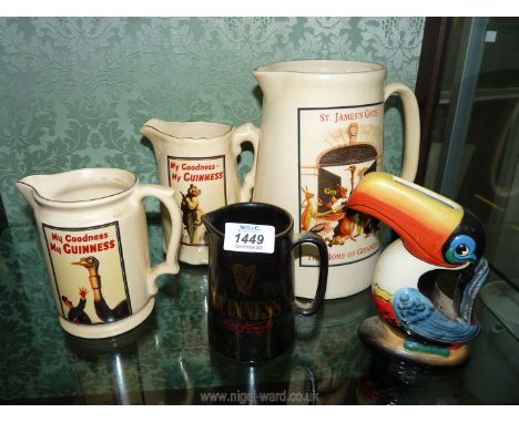 Guinness official merchandise jugs in various sizes and Toucan ceramic jug.