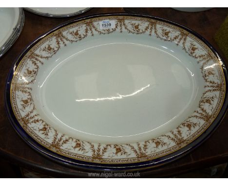 A Royal Worcester meat plate, worn at the rim. 18 3/4" x 12 3/4".