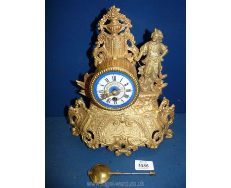 A 19th c. gilt metal and enamel Clock in the Rococo style, 11 1/2'' tall.