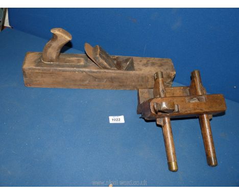 A wooden sash fillister or plough plane and large wooden Jack plane.