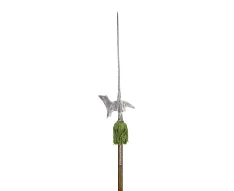 A GERMAN HALBERD, LAST QUARTER OF THE 16TH CENTURY with long terminal spike of diamond-section, forward-leaning axe-blade pie