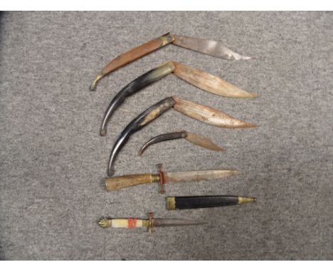 FOUR SPANISH FOLDING KNIVES, A CONTINENTAL HUNTING DAGGER, AND A STILETTO, LATE 19TH/20TH CENTURY the first two with folding 