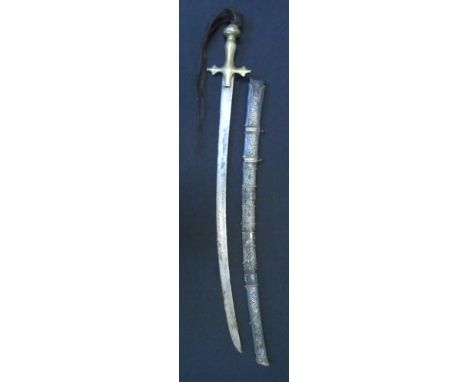 A BATTACK SWORD (PISO PODANG), 19TH CENTURY with curved single-edged blade, brass hilt engraved with pairs of slender lines, 