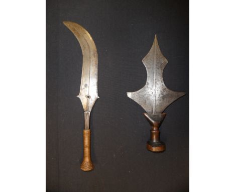 **TWO AFRICAN DAGGERS, PROBABLY CONGO, LATE 19TH/20TH CENTURY the first with symmetrical blade including a pair of broad basa