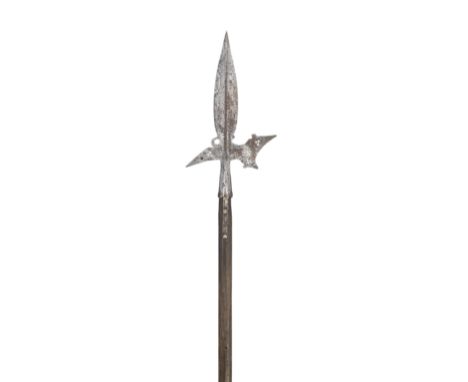 A SOUTH GERMAN HALBERD, EARLY 17TH CENTURY with leaf-shaped central blade formed with a medial ridge and incorporating a pair