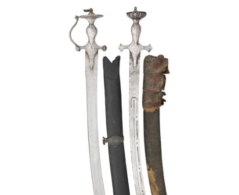 TWO INDIAN SWORDS (TALWAR), LATE 18TH CENTURY the first with curved watered blade double-edged towards the point, formed with