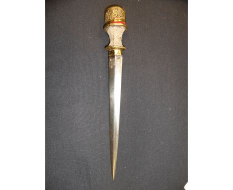 A TIBETAN DAGGER, 18TH/19TH CENTURY with tapering blade of flattened-diamond section, gilt-brass hilt including openwork cap 