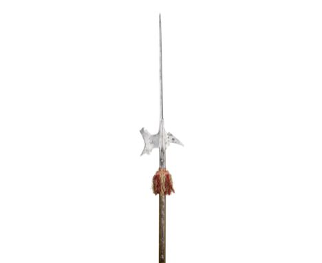 A GERMAN HALBERD, LAST QUARTER OF THE 16TH CENTURY with long terminal spike of diamond-section, curved axe-blade pierced with