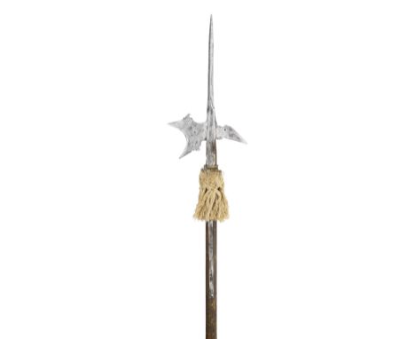 A GERMAN HALBERD, LAST QUARTER OF THE 16TH CENTURY with robust terminal spike of diamond-section, forward-leaning axe-blade p