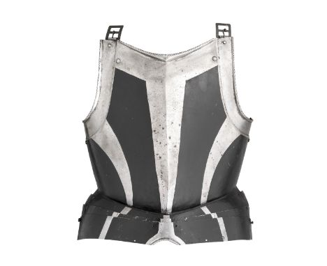 A SOUTH GERMAN 'BLACK AND WHITE' BREASTPLATE, CIRCA 1570-80 with a medially ridged main plate projecting forward over the bel