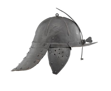 A GERMAN ZISCHÄGGE OF SHOT-PROOF WEIGHT, MID-17TH CENTURY with one-piece hemispherical skull fitted at its apex with a rivet 
