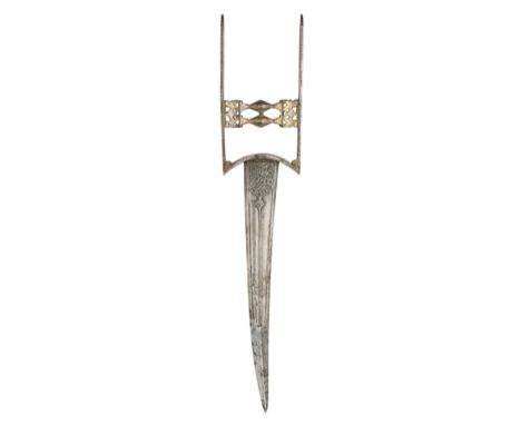 AN INDIAN DAGGER (KATAR), 18TH CENTURY with slightly curved blade formed with a reinforced tip, the lower two thirds formed w