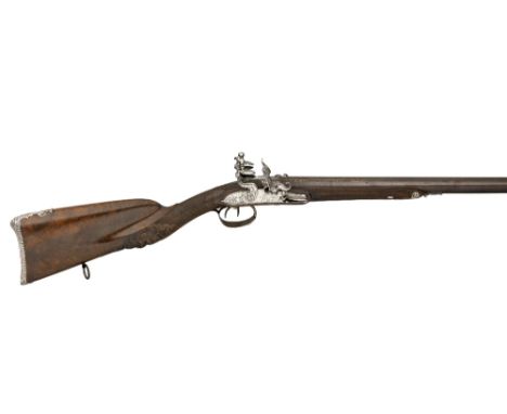 ˜A 20 BORE D.B. FRENCH FLINTOCK SPORTING GUN BY PERIN FILS À POITIERS, CIRCA 1820 with browned twist sighted barrels signed i