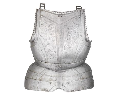 A SOUTH GERMAN BREASTPLATE WITH EMBOSSED DECORATION IN THE 'BLACK AND WHITE' FASHION, CIRCA 1540-50 with a medially-ridged ma