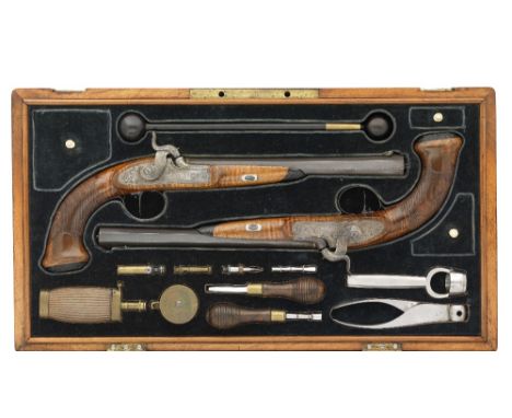 A CASED PAIR OF 80 BORE GERMAN PERCUSSION RIFLED TARGET PISTOLS BY SCHNEEVOIGT IN LAHR, DATED 1836 with browned swamped octag