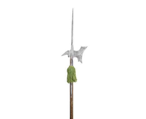 A GERMAN HALBERD, LAST QUARTER OF THE 16TH CENTURY with long terminal spike of diamond-section, forward-leaning axe-blade pie