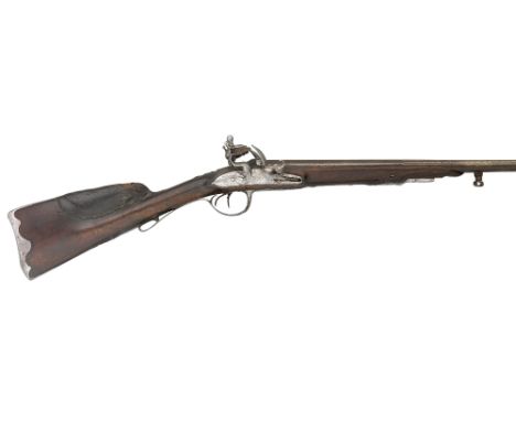 A 20 BORE FRENCH D.B. FLINTLOCK SPORTING GUN BY OUDIN A NANCY, CIRCA 1740 with three-stage sighted barrels inscribed 'Canon T