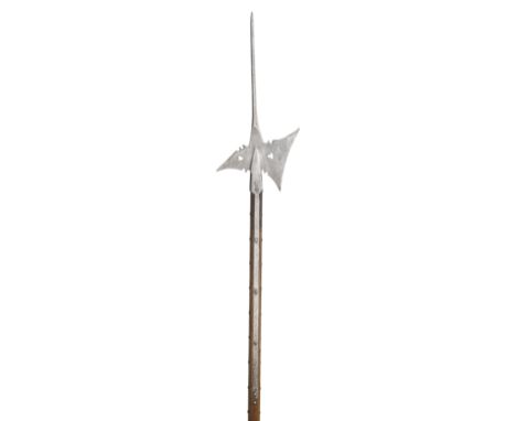 A GERMAN HALBERD, MID-16TH CENTURY with slender central spike, forward leaning curved axe-blade cut with an additional pair o