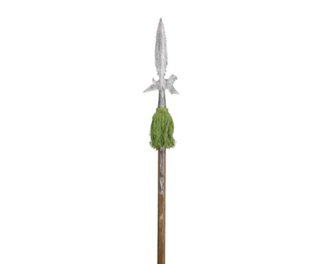 A HALBERD, LATE 16TH CENTURY, PROBABLY AUSTRIAN  with leaf-shaped terminal blade formed with a medial ridge and a pair of cir