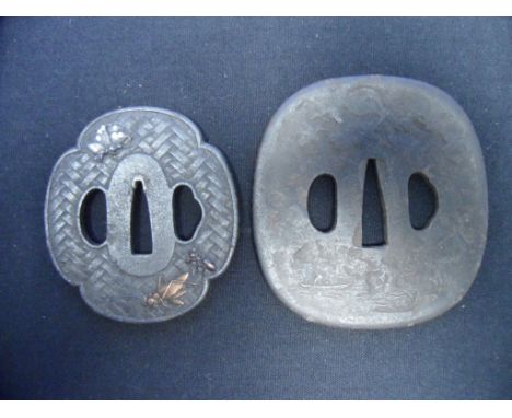 TWO JAPANESE SWORD GUARDS (TSUBA) of iron, the first of mokko gata form with kozuka hitsu-ana and kogai hitsu-ana, decorated 