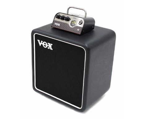 Vox MV50-AC-set guitar amplifier head and speaker cabinet, boxed ( new/old stock)Please note: Whilst all electrical items sol