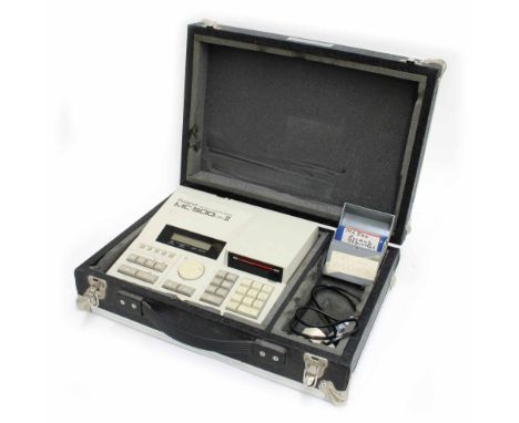 Roland Micro Composer MC-500 Mark II, made in Japan, ser. no. 903160, with floppy disc cartridges, Super-MRC midi real time r
