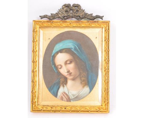 A 20th Century vintage framed miniature print depicting the Virgin Mary with hands together looking downward in golden frame.