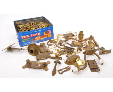 A large collection of vintage 20th Century brass items to include door knobs and door handles, light fixtures, locks and hing