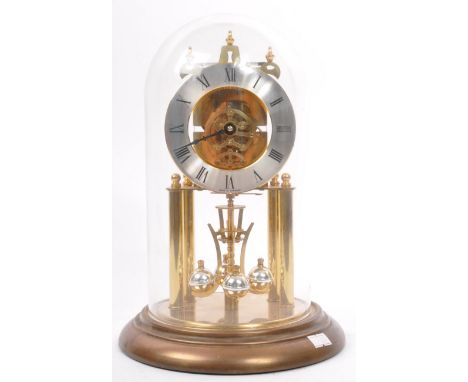 A vintage retro 20th Century anniversary mantle piece clock by S Haller,&nbsp;Germany.&nbsp;Having roman numerals to face, ra
