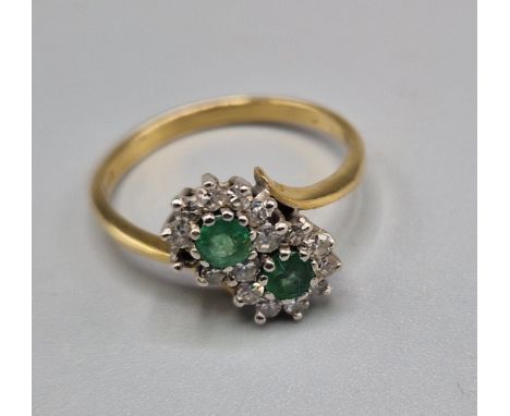 A 9ct gold Emerald and diamond set crossover ring, (one stone missing) ring size N, 2.1grams together with a cultured pearl n