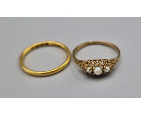 A 22ct Gold Wedding Band, 1.9g, together with a 9ct gold pearl set dress ring 1.1g 
