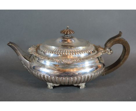 An Edwardian Silver Teapot of oval half lobed form, London 1909, Goldsmiths &amp; Silversmiths Company, Regent Street, 23 ozs