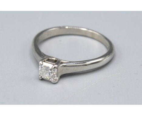 A Tiffany &amp; Co. Lucida Platinum Solitaire Diamond Ring set with square diamond 0.52ct. dated 1999 ring size O 4.5gms. 