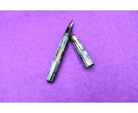 A Waterman 512V fountain, light and dark green strait, lever fill