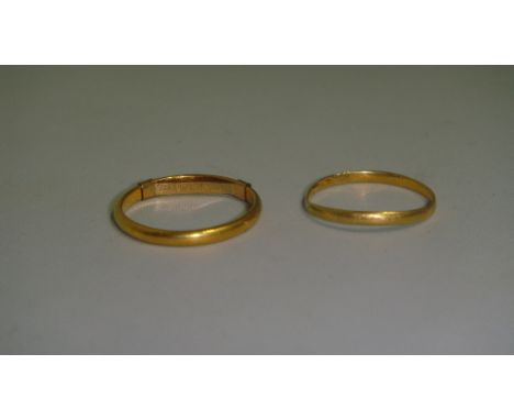 22 ct gold wedding band & one other 9 ct gold wedding ring in presentation case