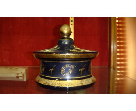 Blue glass powder jar and lid decorated in enamels with Chinese pagodas (some light chipping)