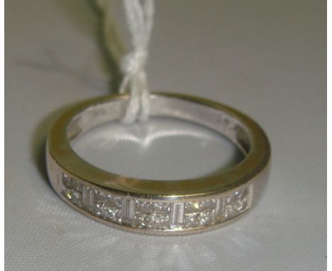 Modern 18 ct white ring set with 20 small diamonds
