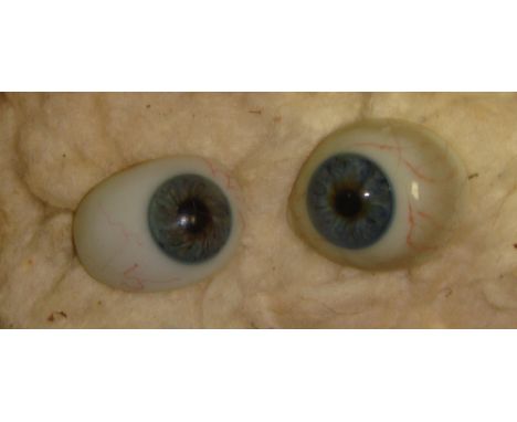 Pair of vintage glass eyes in Curry & Paxton Ltd box medical interest