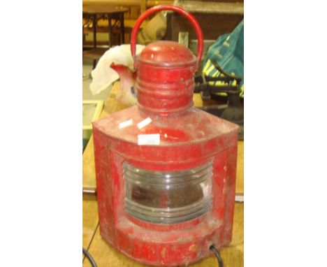 Red painted ships lamp