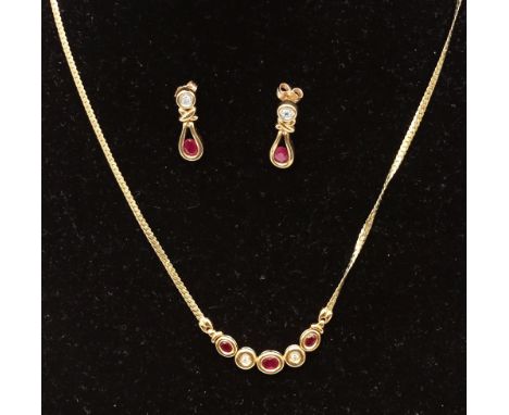 9ct Gold Ruby and Diamond Necklace with 9ct Gold Ruby and Diamond Drop Earrings  The 9ct Gold and Diamond Necklace is hallmar