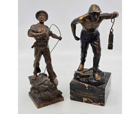 A Bronze 'Wilhelm Warmuthm' figure of a miner lighting his way with a lamp, on the ground between his feet a pick axe. set on