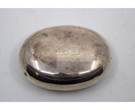 Sterling Silver Oval Shaped Snuff Box  The Box has Initials "A.B.D" on the front cover.  The Snuff Box is hallmarked with the