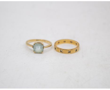 Two 9ct Gold Rings To include a 9ct Gold Square Modified Brilliant Cut Pale Blue Stone Ring and a 9ct Gold Cubic Zirconia Ful